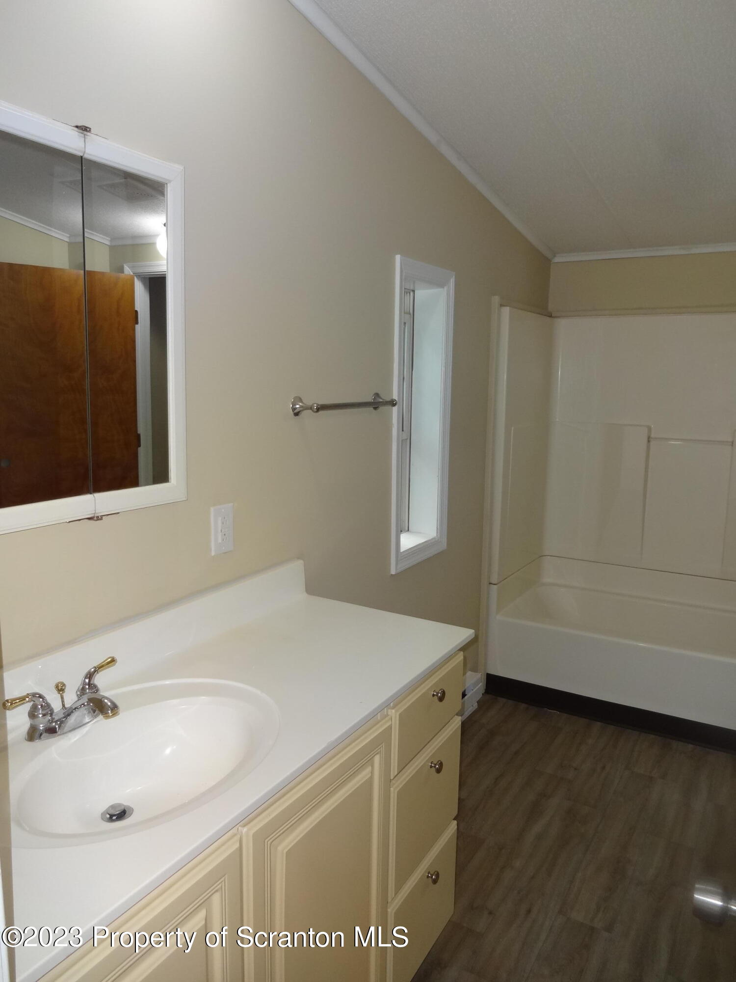 22 Hi View Terrace. Lake Ariel, PA 18436 - Photo 16 of 28 a bathroom with a sink and a mirror