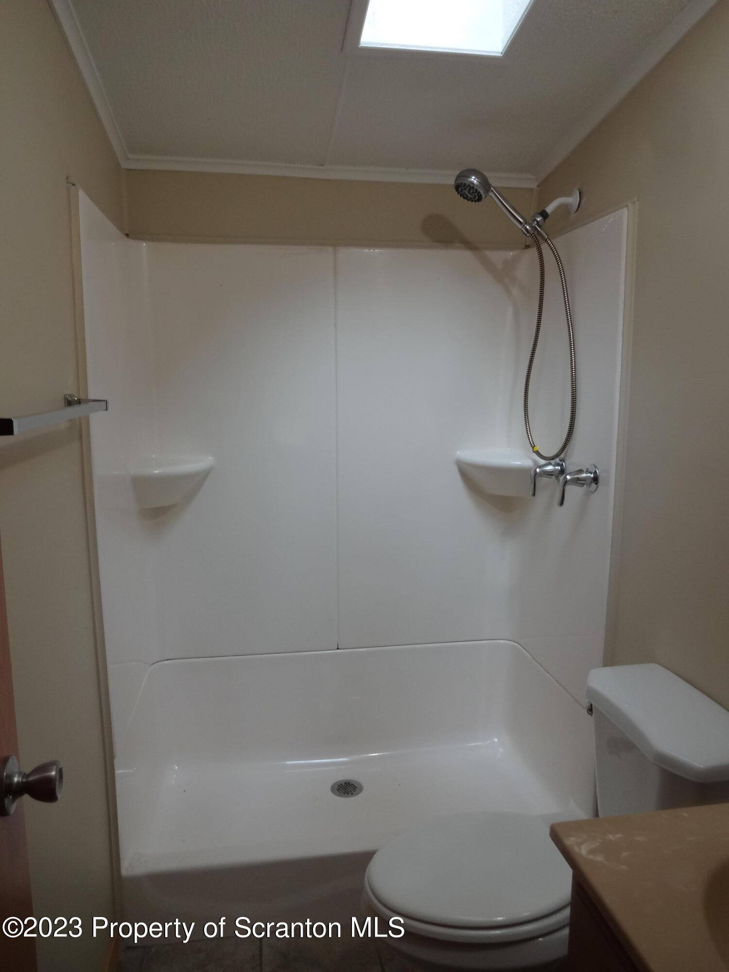 22 Hi View Terrace. Lake Ariel, PA 18436 - Photo 20 of 28 a bathroom with a shower and a toilet