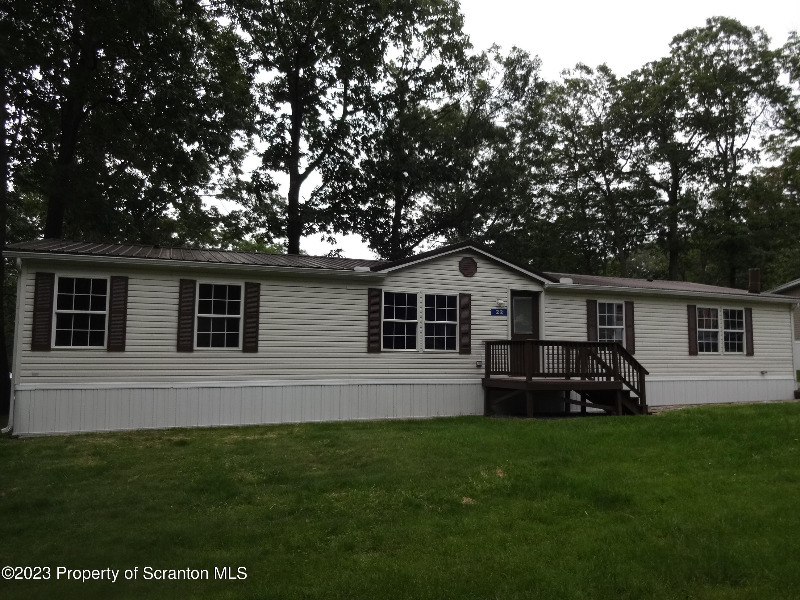 22 Hi View Terrace. Lake Ariel, PA 18436 - Photo 26 of 28 a front view of house with yard and green space