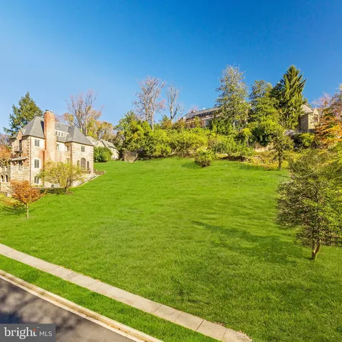 a view of a big yard with a garden