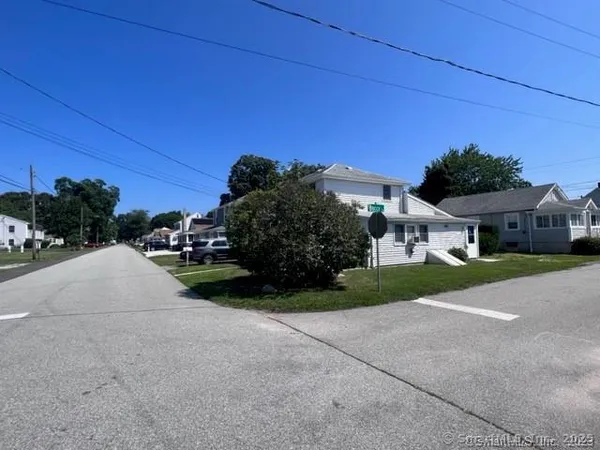 a view of a house with a street