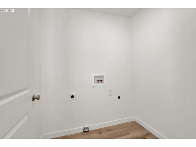 a view of small space with wooden floor