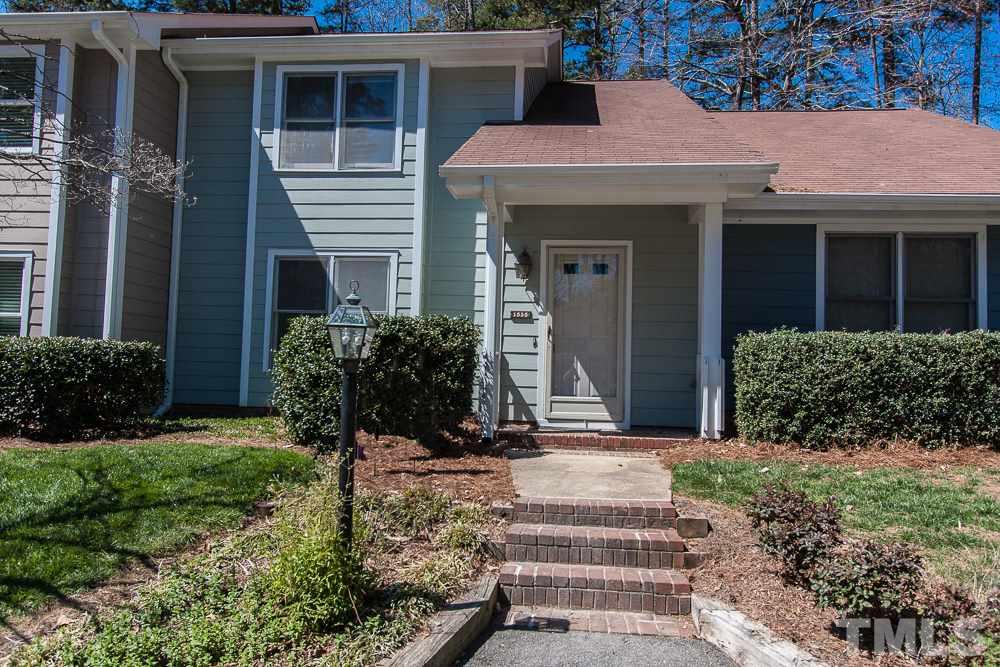 1535 Edgeside Court Raleigh, NC 27609 - Photo 1 of 20 a front view of a house with a yard
