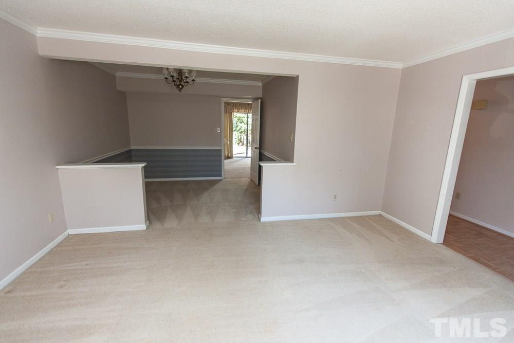 1535 Edgeside Court Raleigh, NC 27609 - Photo 12 of 20 an empty room with windows and entrance