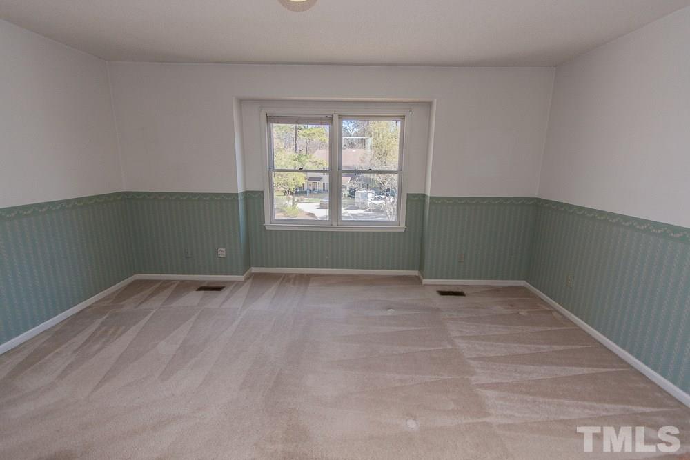 1535 Edgeside Court Raleigh, NC 27609 - Photo 15 of 20 a view of an empty room with a window