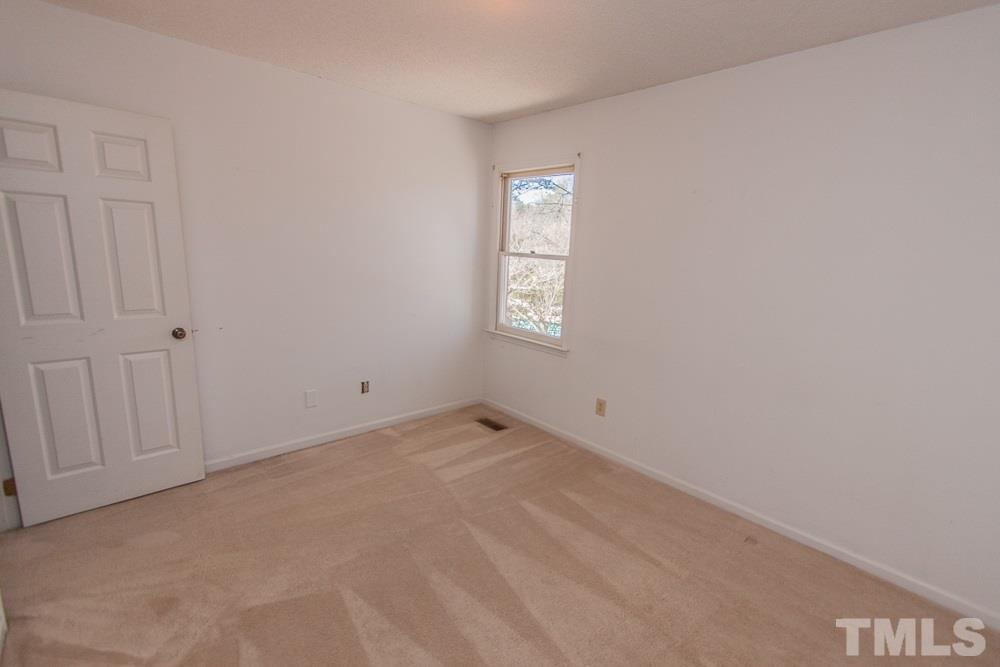 1535 Edgeside Court Raleigh, NC 27609 - Photo 20 of 20 a view of an empty room and window
