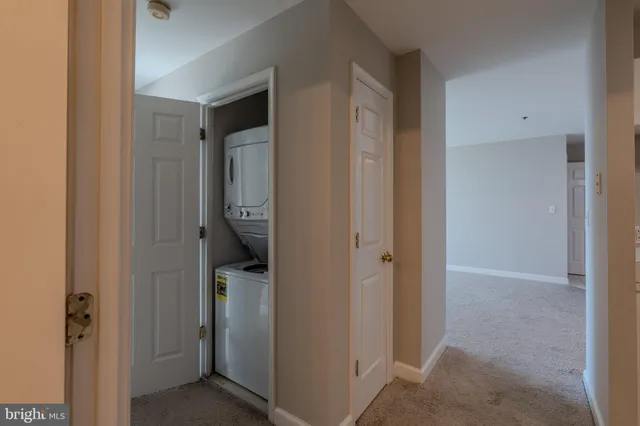 a kitchen with a refrigerator stove and microwave