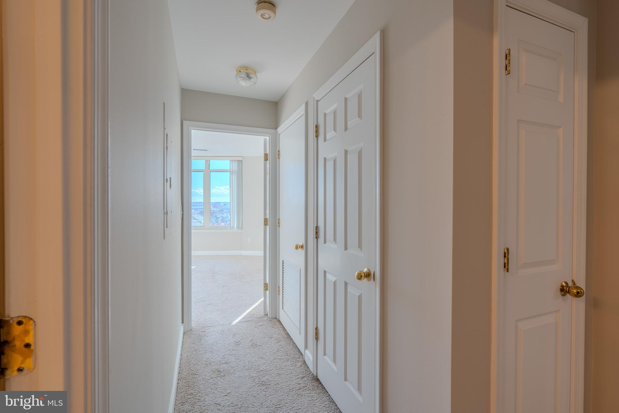 100 Harborview Drive, Unit 1208 Baltimore, MD 21230 - Photo 22 of 36 a view of a hallway with a elevator