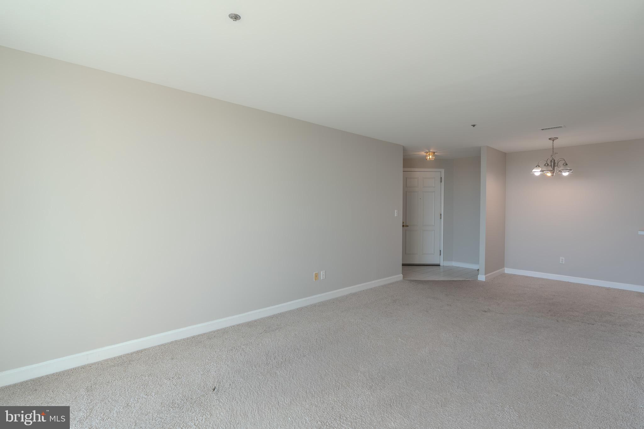 100 Harborview Drive, Unit 1208 Baltimore, MD 21230 - Photo 7 of 36 a view of an empty room