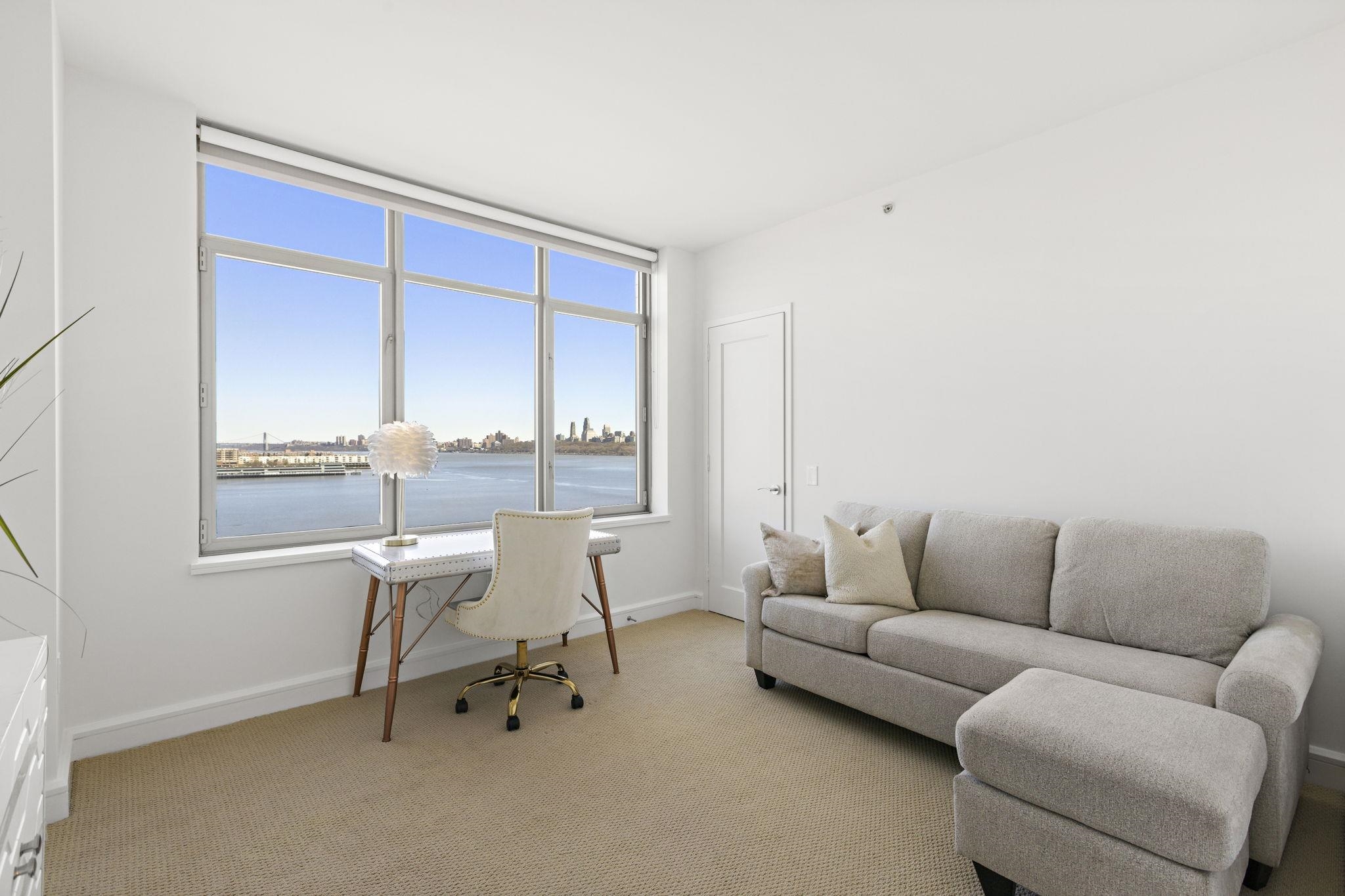 8100 River Road, Unit 1013 North Bergen, NJ 07047 - Photo 16 of 19 a work room with furniture and a window