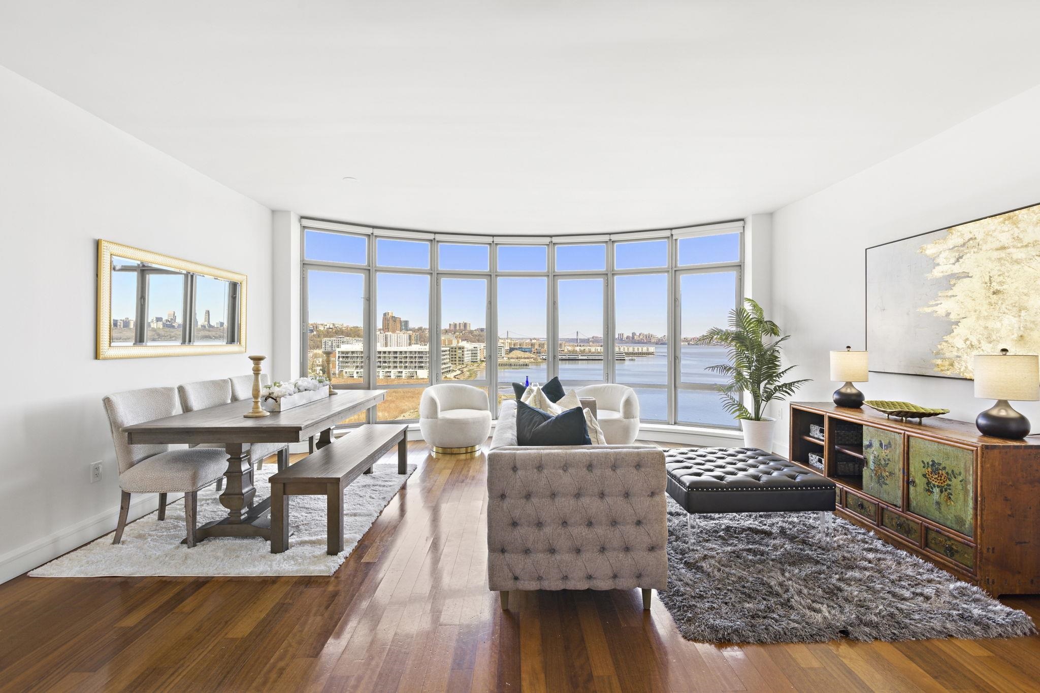 8100 River Road, Unit 1013 North Bergen, NJ 07047 - Photo 8 of 19 a living room with furniture wooden floor and a table