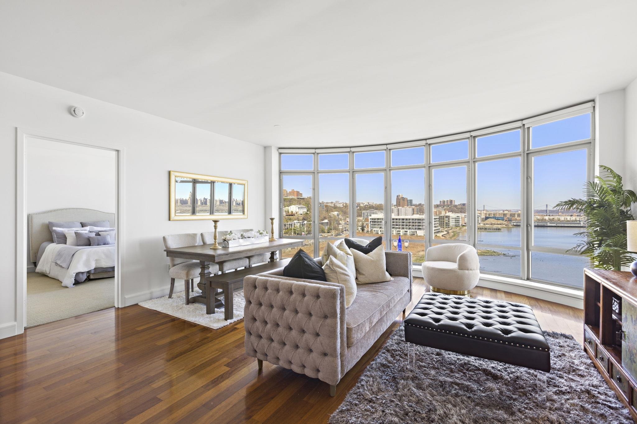 8100 River Road, Unit 1013 North Bergen, NJ 07047 - Photo 9 of 19 a living room with furniture and a large window