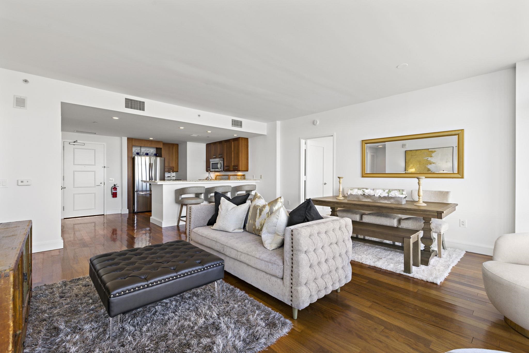 8100 River Road, Unit 1013 North Bergen, NJ 07047 - Photo 10 of 19 a living room with furniture and a wooden floor