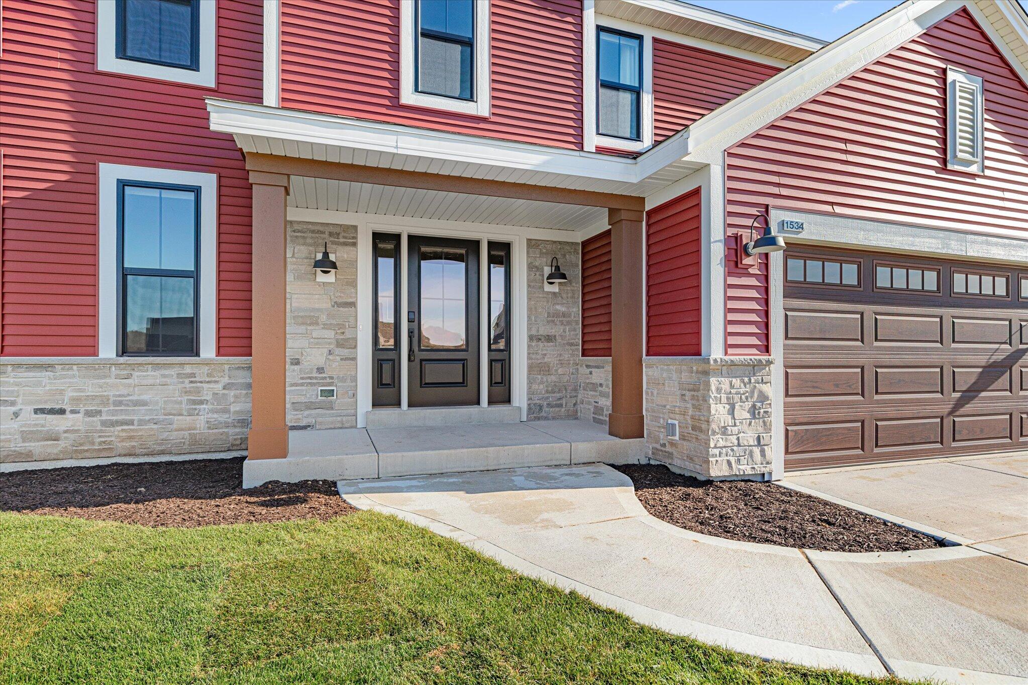 1534 Fairwinds Boulevard, Unit LT16 Mukwonago, WI 53149 - Photo 2 of 35 1534 Fairwinds Blvd 02 Front Entry