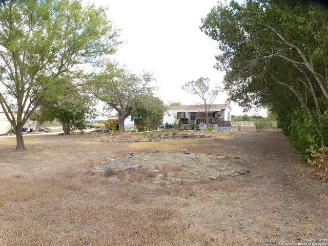 a view of house with outdoor space