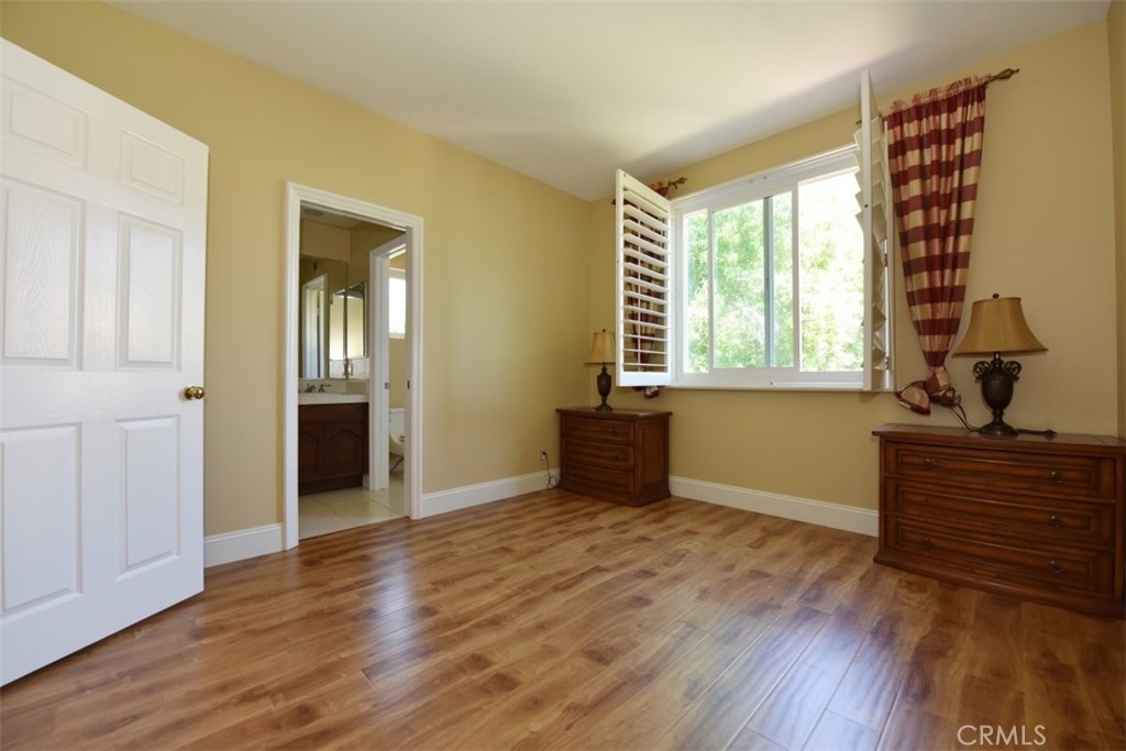 12 Brigadier Irvine, CA 92603 - Photo 45 of 50 a view of an empty room with a window and wooden floor