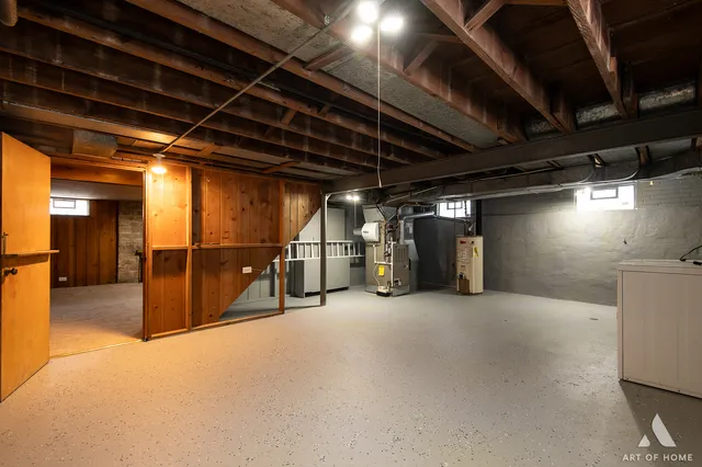 a view of empty room with refrigerator
