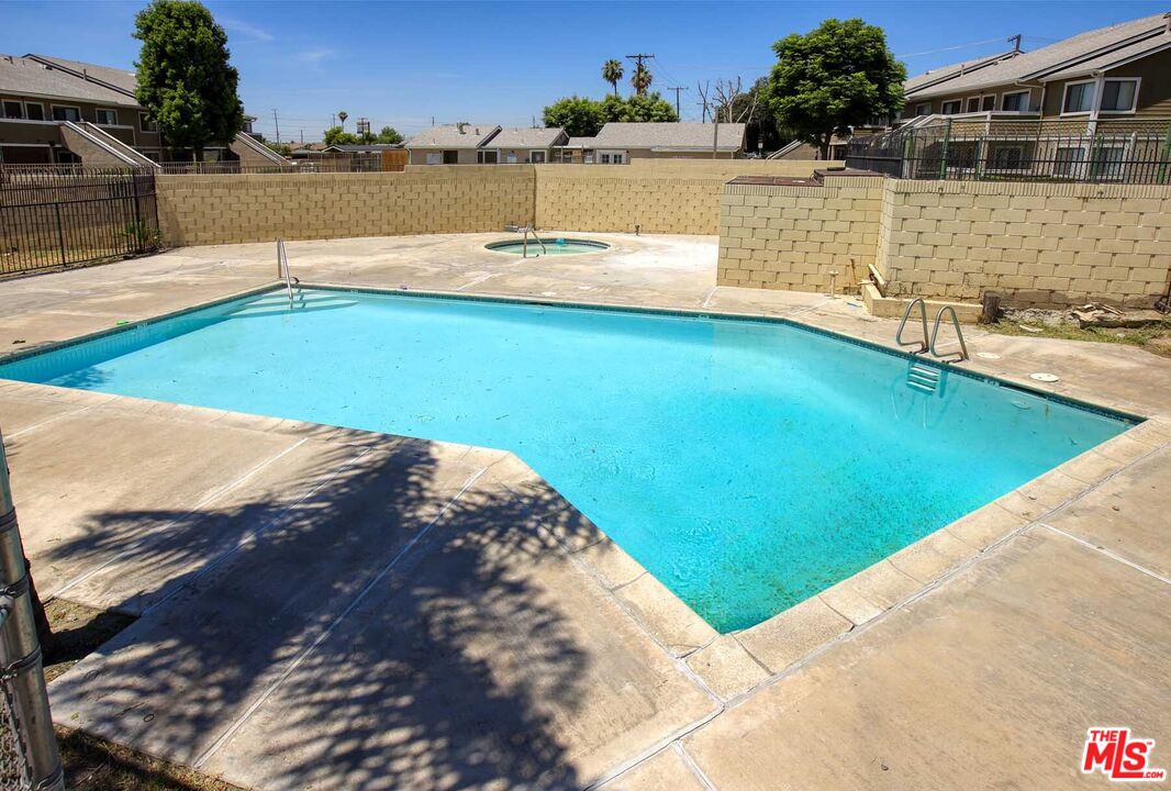 936 East Fairway Drive, Unit 23 Colton, CA 92324 - Photo 22 of 32 a view of a swimming pool with an outdoor space