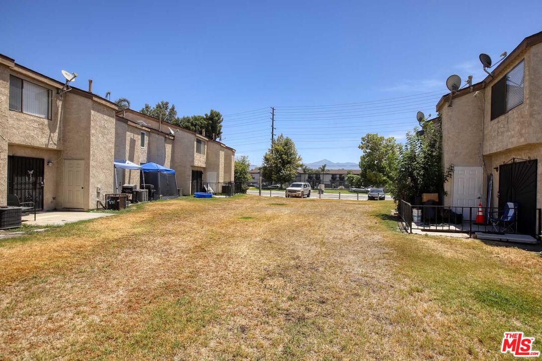 936 East Fairway Drive, Unit 23 Colton, CA 92324 - Photo 25 of 32 a view of a street with houses