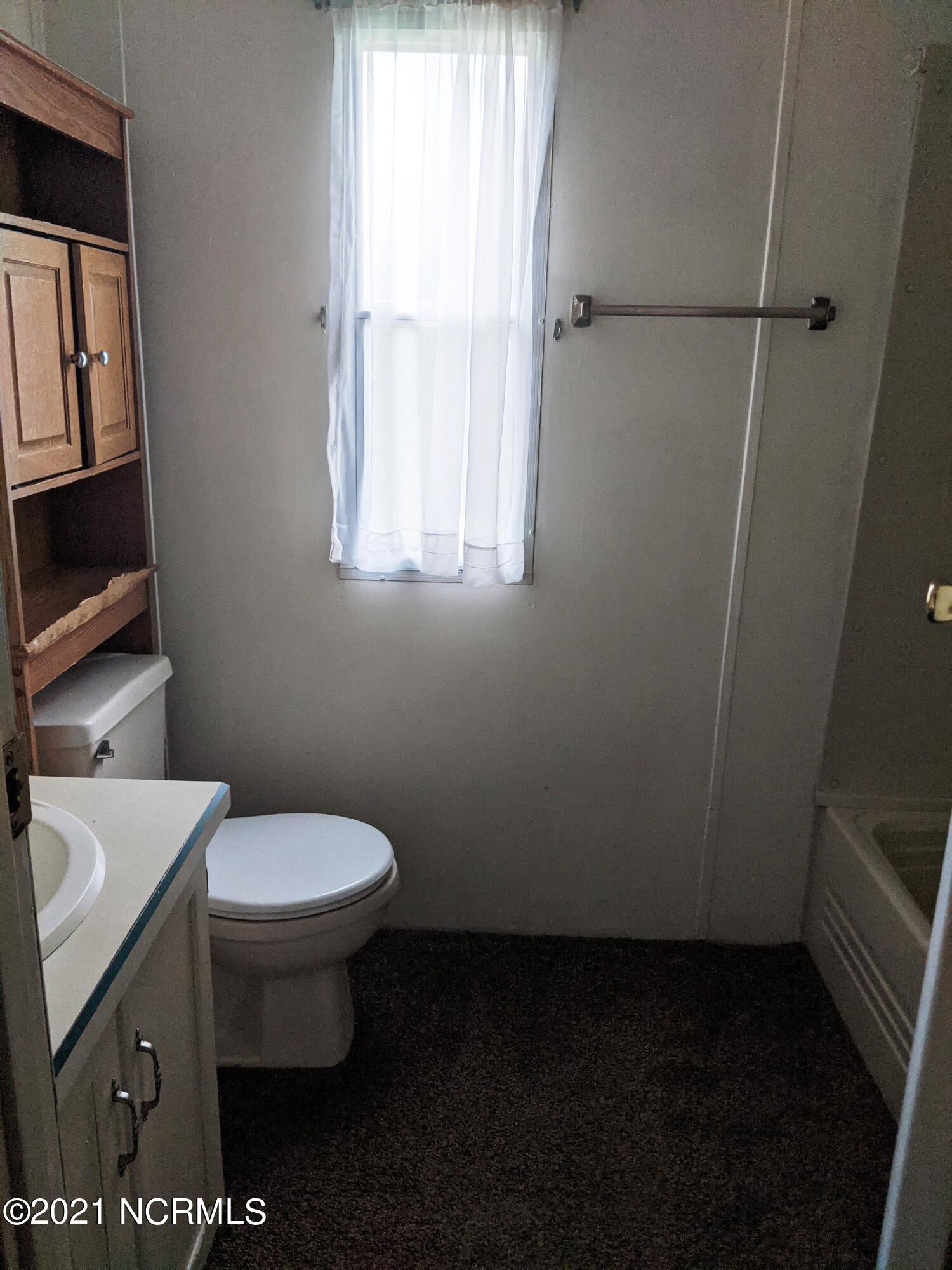 3913 Weaver Road Wilson, NC 27893 - Photo 8 of 10 Hall Bath
