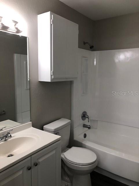 957 Salt Pond Place, Unit 101 Altamonte Springs, FL 32714 - Photo 11 of 20 a bathroom with a sink toilet and shower
