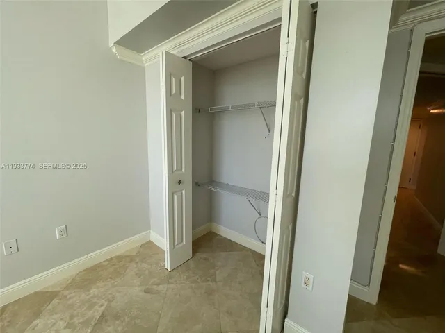 a view of outdoor space with seating area and trees