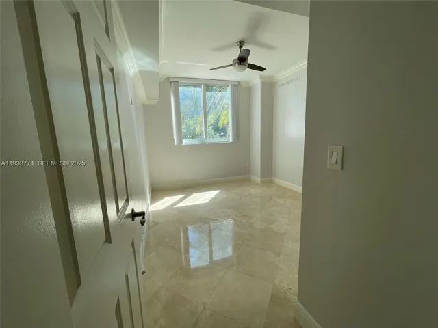 a bathroom with a shower and a mirror