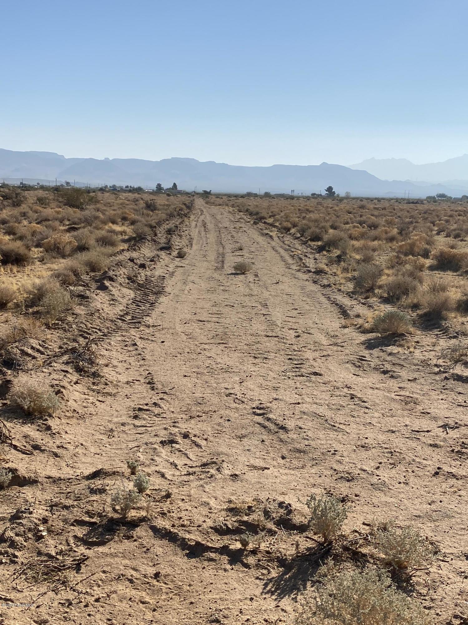 1584 Colorado Road Golden Valley, AZ 86413 - Photo 16 of 26 16-Cleared perimeter rd on North side lo