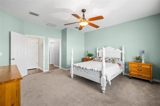 a view of an house with backyard of a house