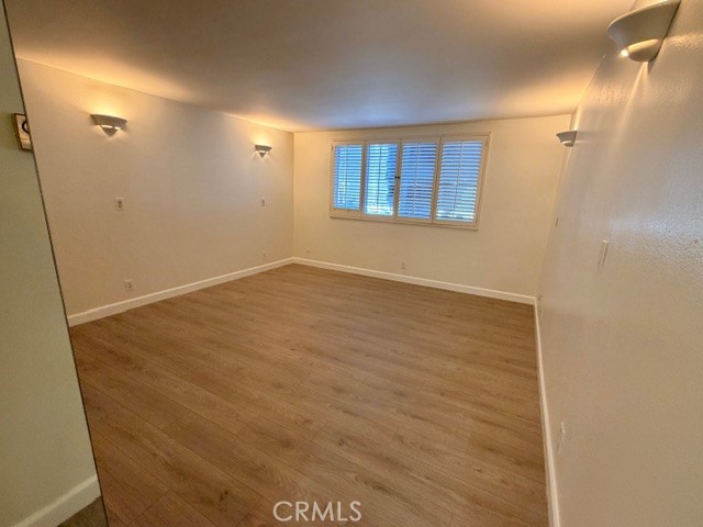 14106 Dickens Street, Unit 101 Sherman Oaks, CA 91423 - Photo 15 of 26 a view of an empty room with a window