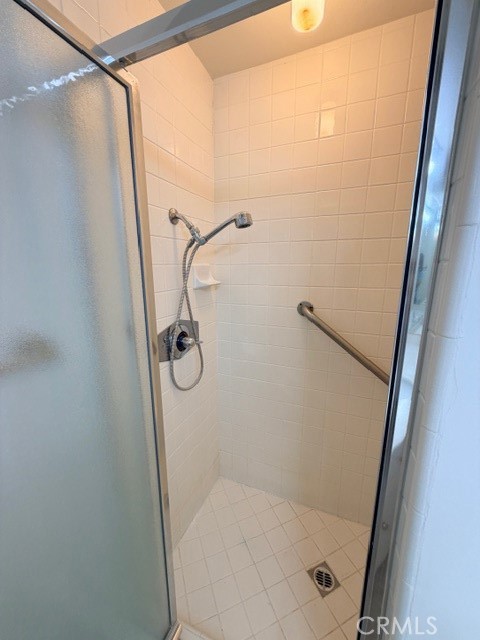14106 Dickens Street, Unit 101 Sherman Oaks, CA 91423 - Photo 19 of 26 a bathroom with a glass shower door