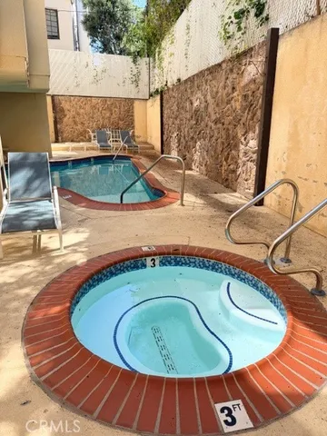 a room with gym equipment and a large window