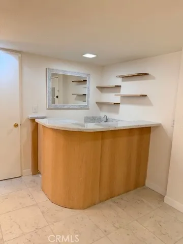 a view of a hallway with stairs