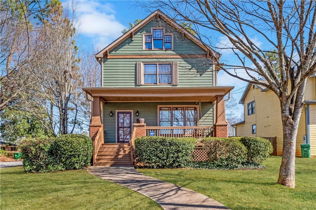 1880 Eastfield Street Decatur, GA 30032 - Photo 1 of 1 front view of a house with a yard