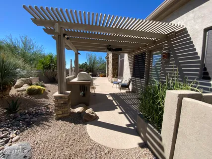 a view of a porch with furniture