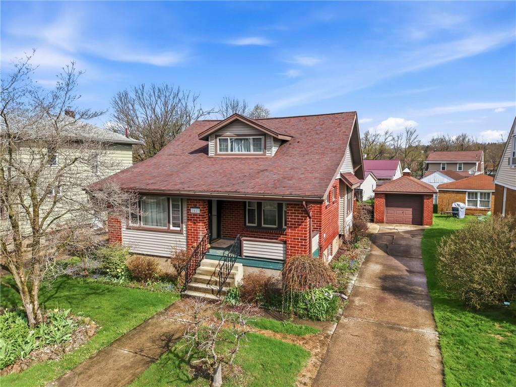 1027 Myrtle Place Sharon, PA 16146 - Photo 18 of 19 a front view of a house with garden