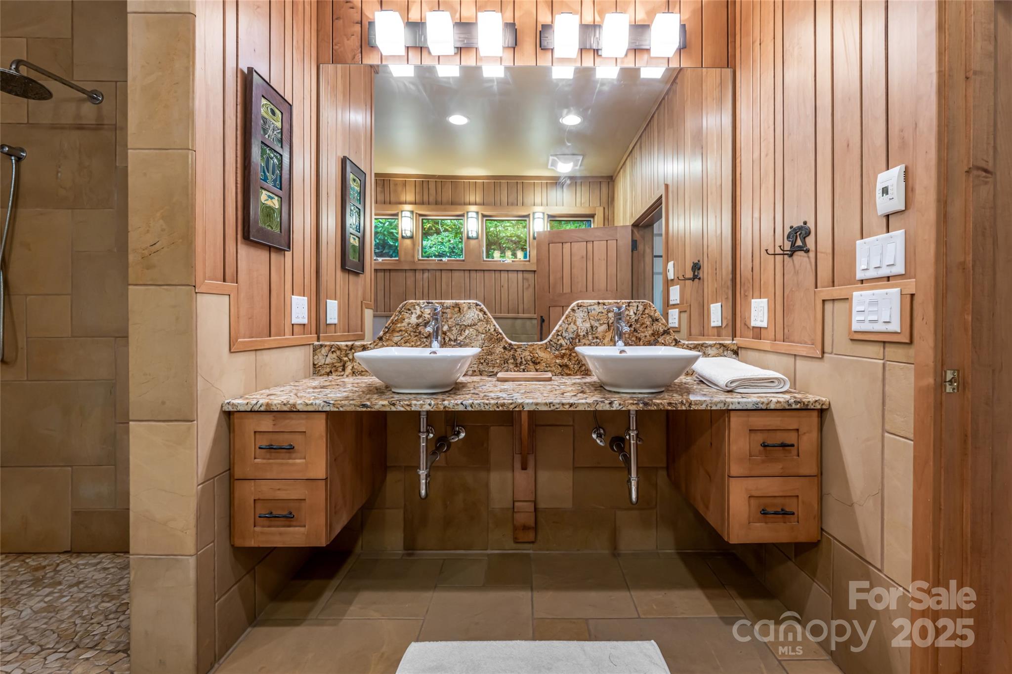 147 Dye Leaf Road Fairview, NC 28730 - Photo 21 of 46 a kitchen with stainless steel appliances granite countertop a sink and cabinets
