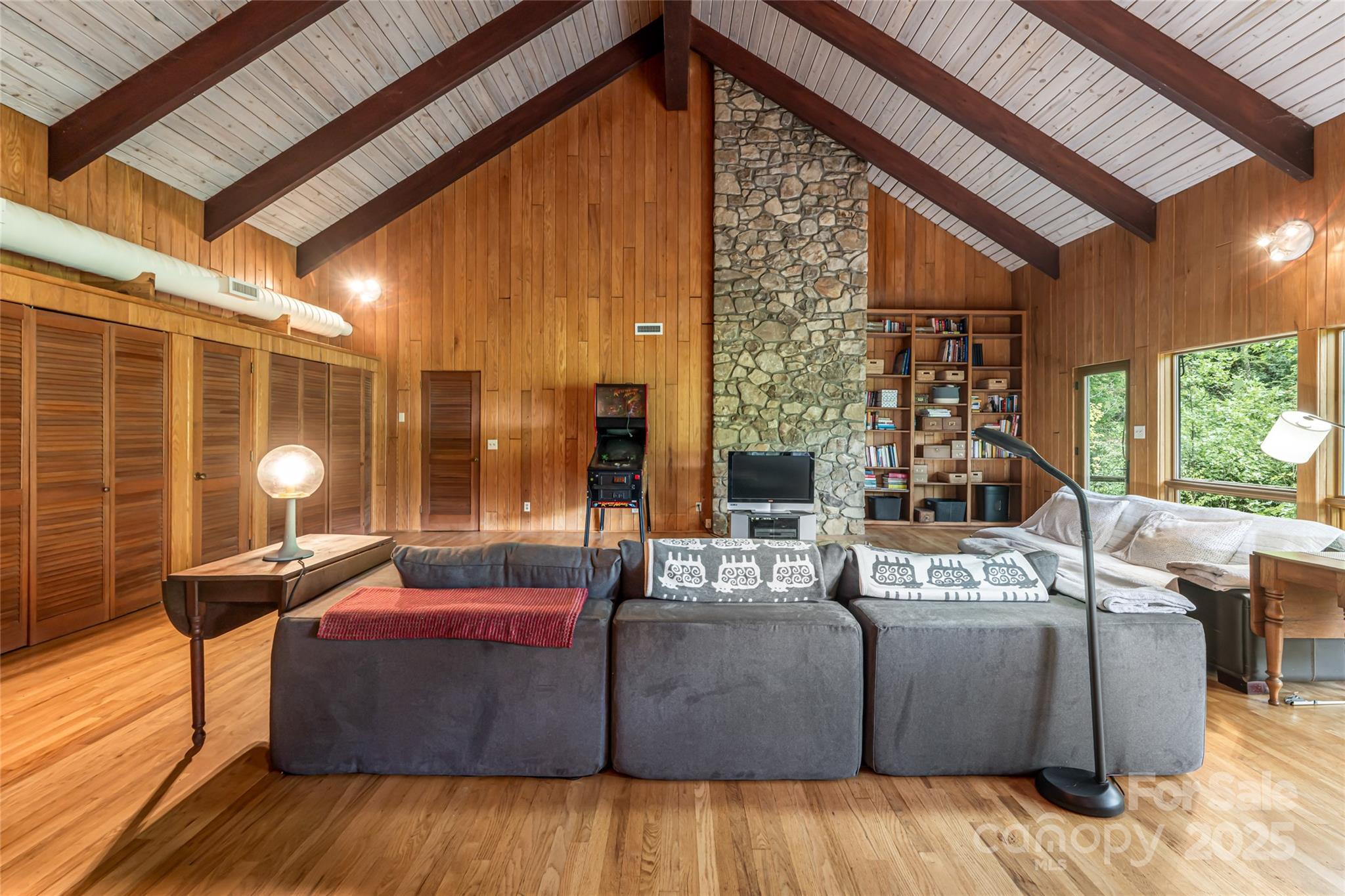 147 Dye Leaf Road Fairview, NC 28730 - Photo 24 of 46 a living room with furniture and a large window