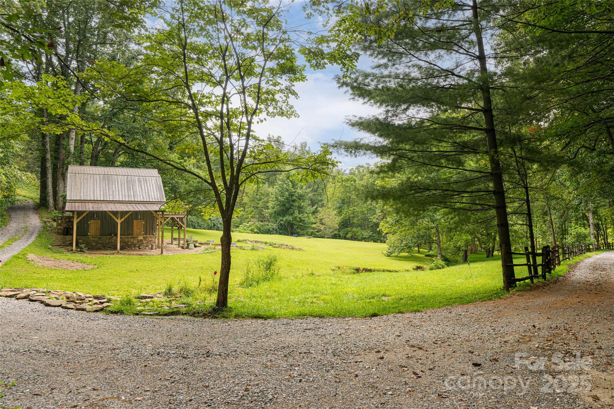 147 Dye Leaf Road Fairview, NC 28730 - Photo 37 of 46 a view of a backyard