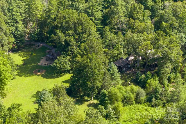 a view of a field with a mountain in the background