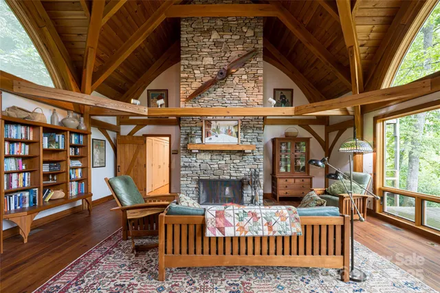 a outdoor living space with patio furniture and a rug