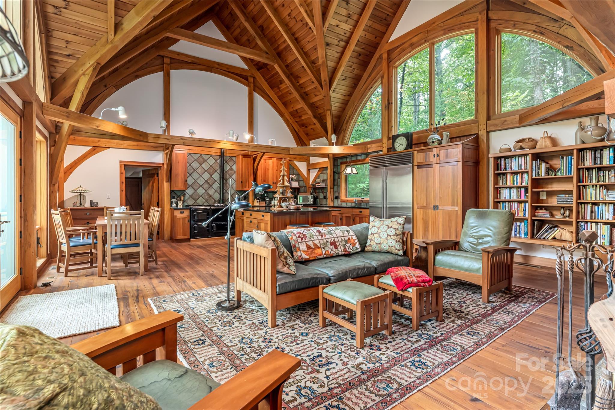 147 Dye Leaf Road Fairview, NC 28730 - Photo 9 of 46 a outdoor living space with patio furniture and a rug