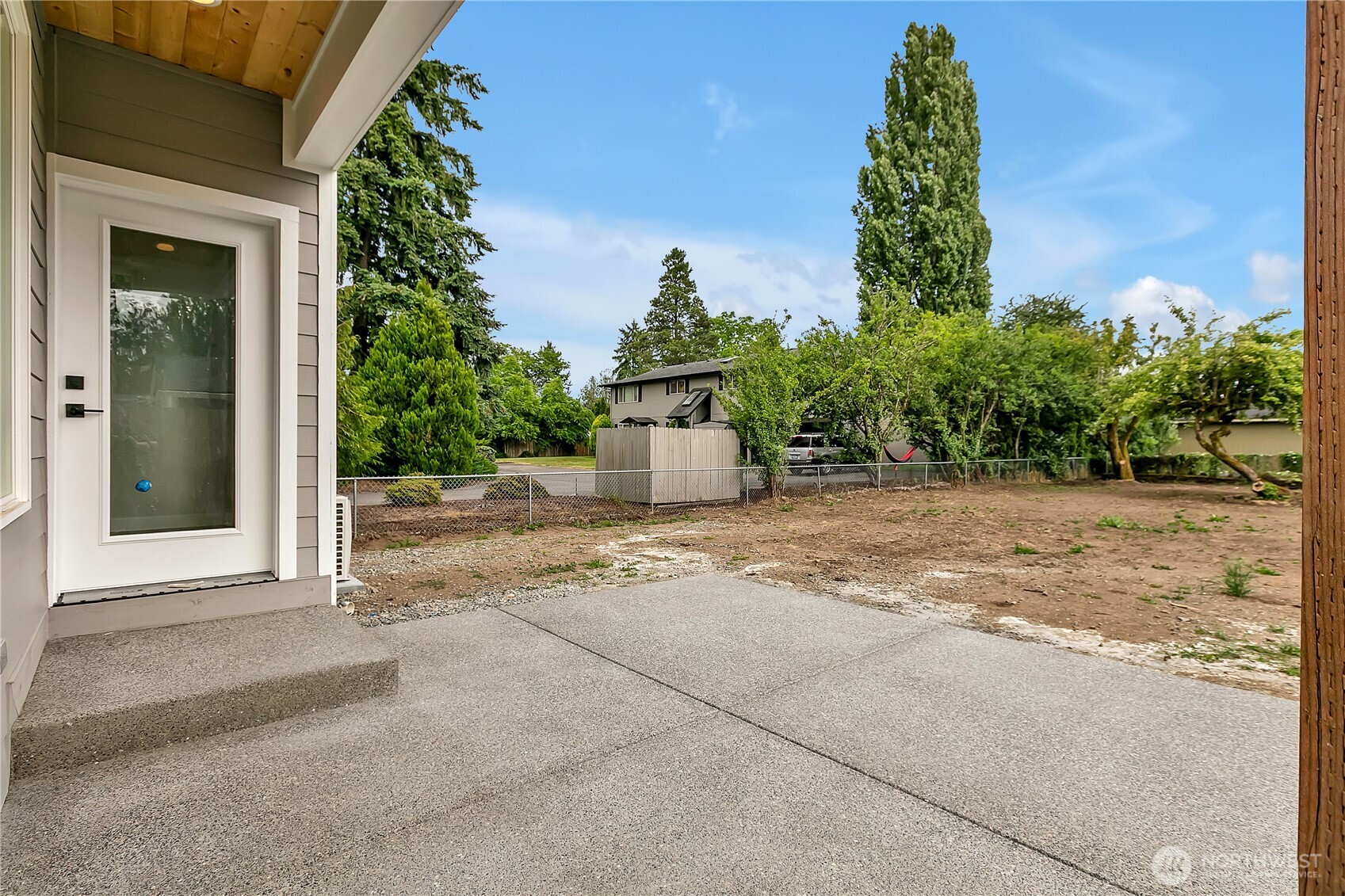 608 B Deeded Street Orting, WA 98360 - Photo 26 of 26 front view of a house with a yard