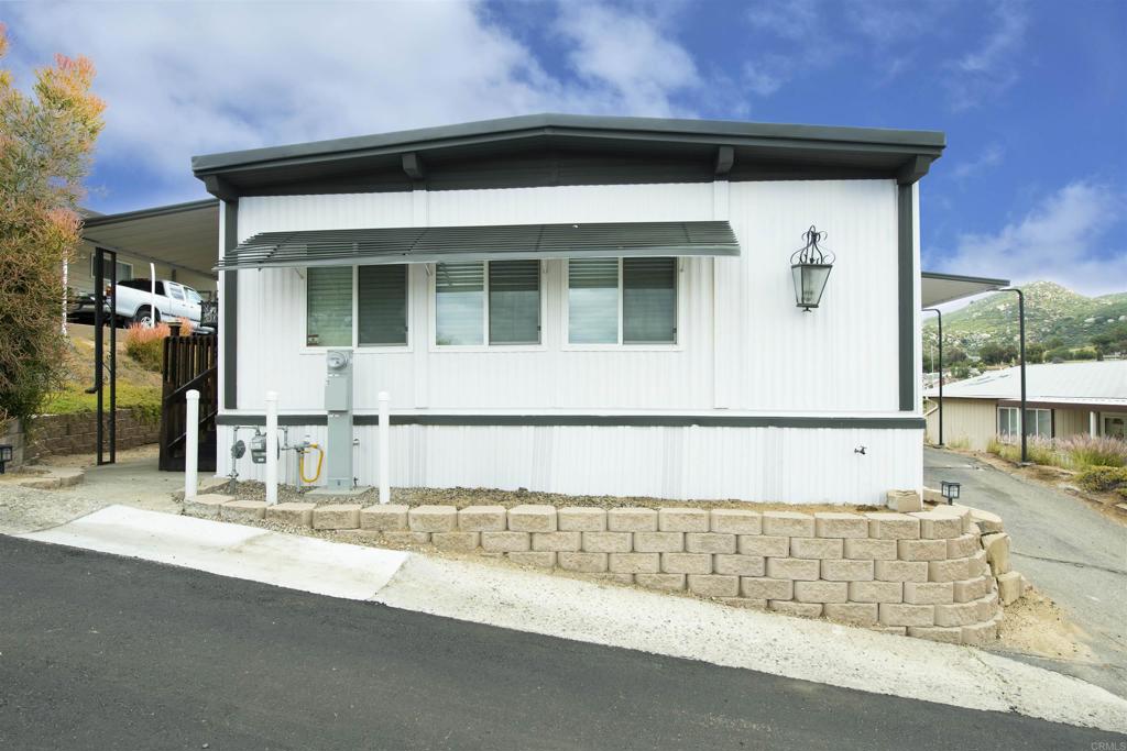 a view of a house with a street