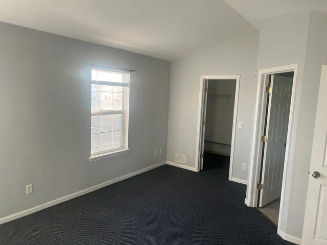 an empty room with closet