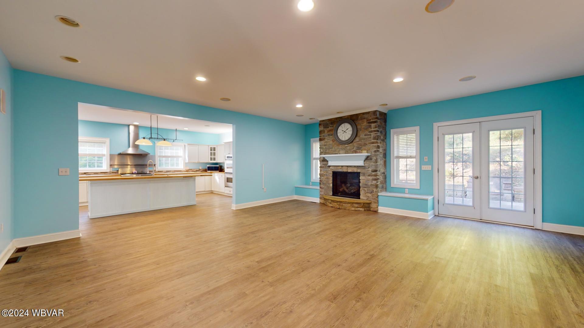 1885 Ravine Road Williamsport, PA 17701 - Photo 6 of 41 Spacious open family room with stone fireplace
