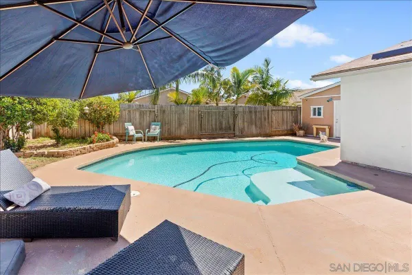 a view of yard with patio