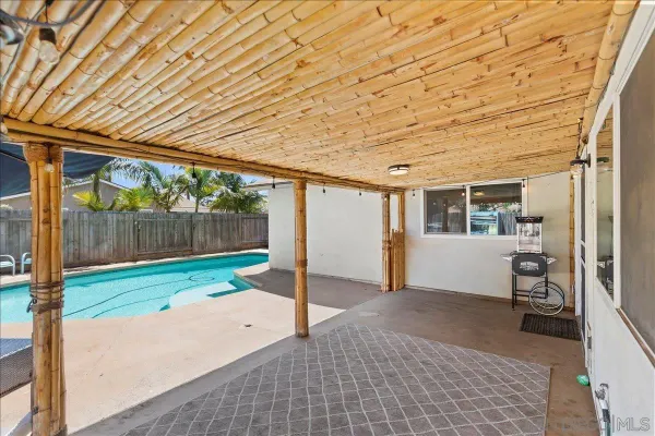 a backyard of a house with garden