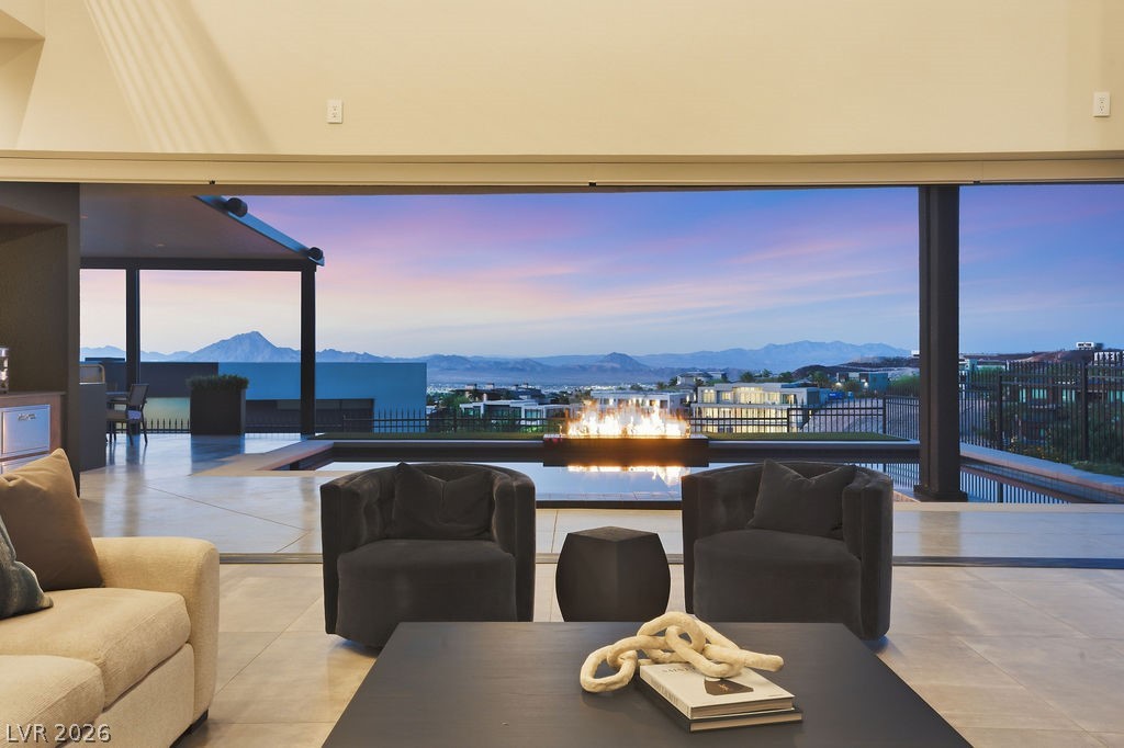 1456 Solitude Ridge Drive Henderson, NV 89012 - Photo 5 of 94 9-Panel Pocket Door for Seamless Indoor/Outdoor Living