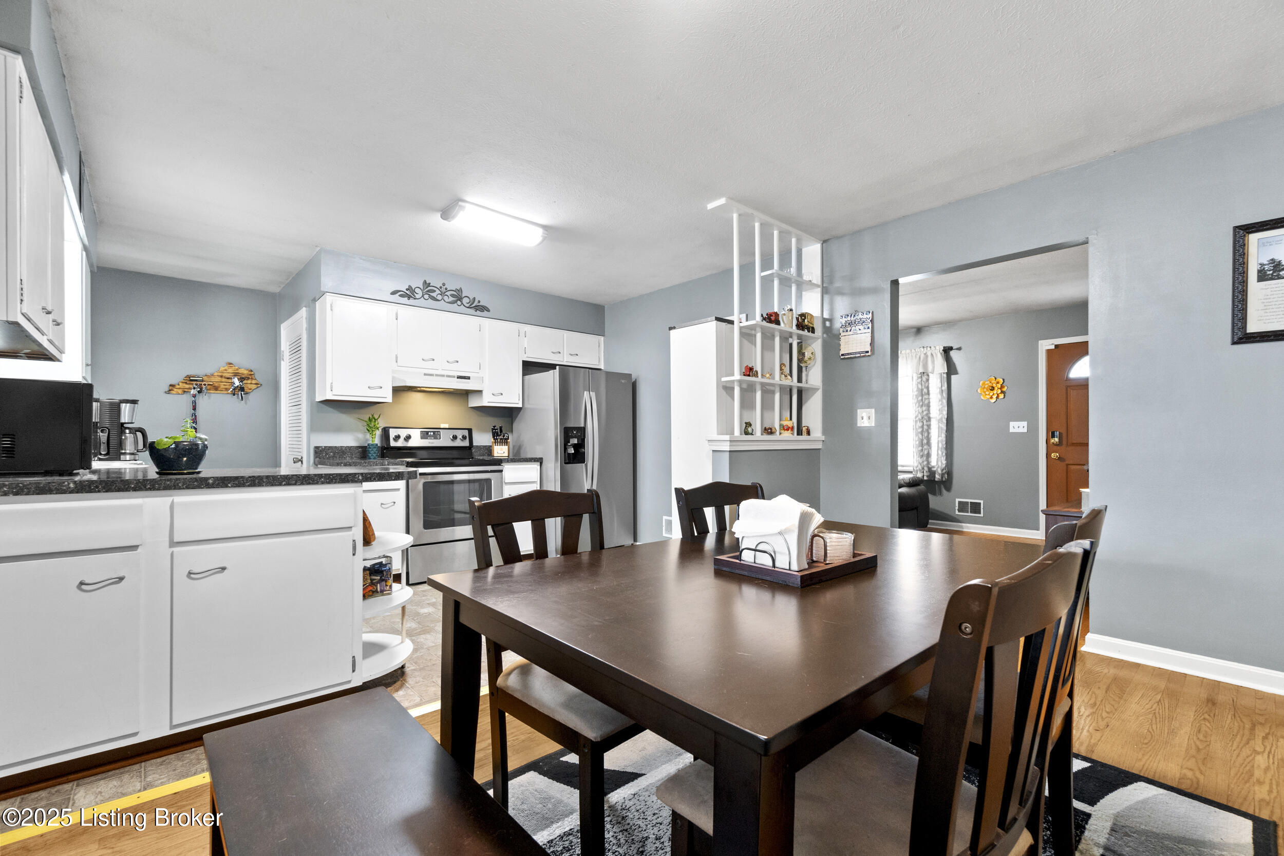 718 Palatka Road Louisville, KY 40214 - Photo 4 of 34 DINING AREA AND KITCHEN BEYOND